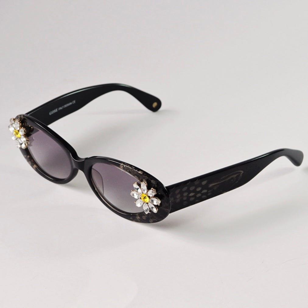 Nix daisy oval sunglasses [black]